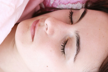 Image showing Beautiful young woman sleeping.