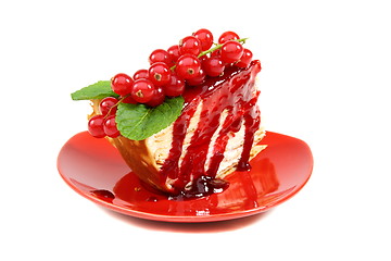 Image showing Crepe cake with berry sauce.