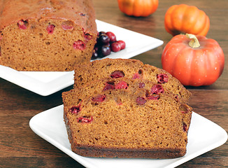 Image showing Pumpkin Cranberry Bread, sliced and whole. 