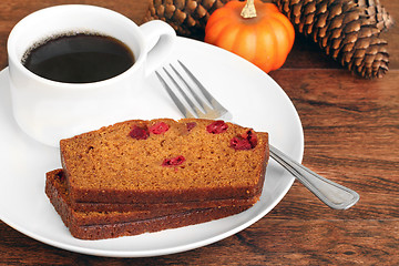 Image showing Sliced Pumpkin Cranberry Cake with Coffee