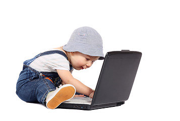 Image showing Little boy with a laptop