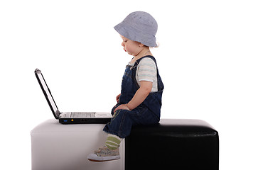 Image showing Little boy with a laptop