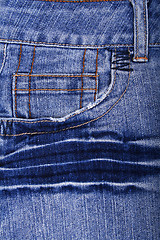 Image showing Blue jeans fabric with pocket as background 