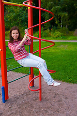 Image showing happy young woman on playground