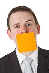 Image showing Businessman with a blank  adhesive note over his mouth