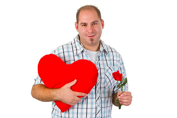 Image showing Young man holding red heart