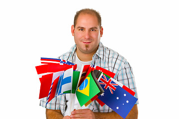 Image showing Young man with international flags