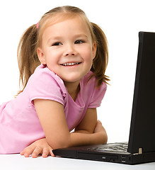 Image showing Little girl with laptop