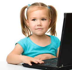 Image showing Little girl with laptop