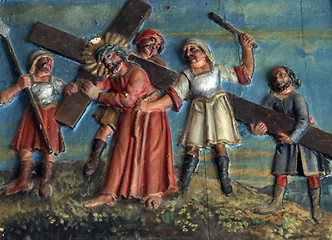 Image showing Simon of Cyrene carries the cross