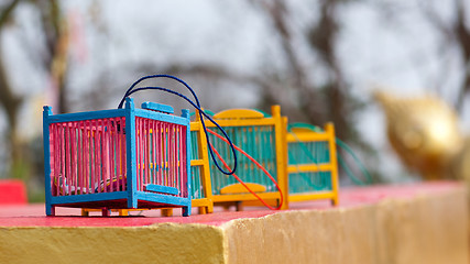 Image showing Bird cages at Buddhist temple