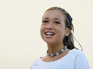 Image showing Happy girl with a necklace