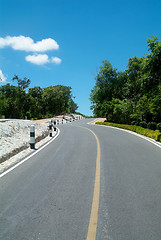 Image showing Winding road over a hill