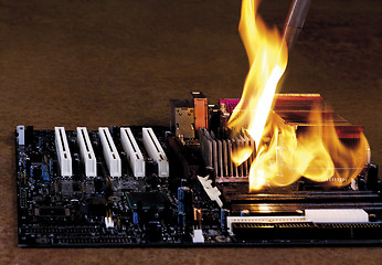 Image showing flames on electronic