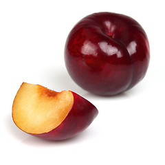 Image showing Fresh plum with slice