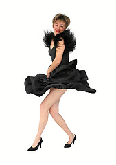 Image showing Girl in black dress dancing