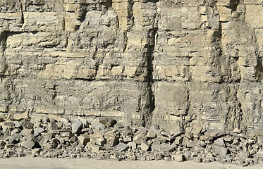 Image showing light brown stone pit wall