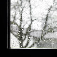 Image showing edge of a window and raindrops