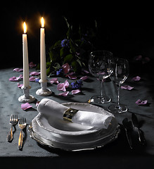 Image showing festive place setting and candlelight