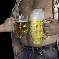 Image showing man and painted beer belly