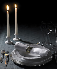 Image showing festive place setting and candlelight