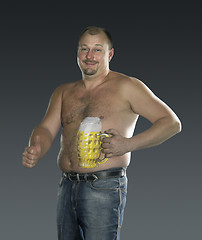 Image showing man with painted beer belly