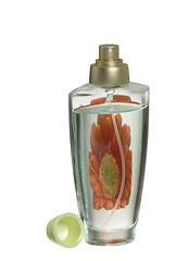 Image showing perfume bottle and flower