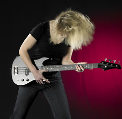 Image showing playing bass guitar