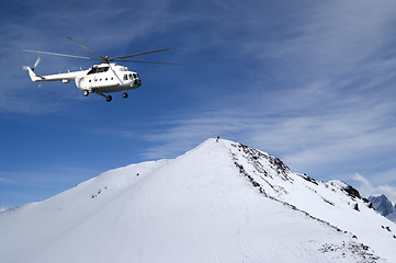 Image showing Heliski in snowy mountains