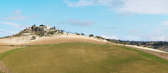 Image showing Rural landscape with ruin of farmhouse on the hill