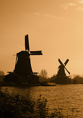 Image showing Dutch windmills silhouettes