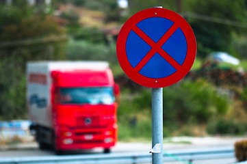 Image showing Traffic sign with car in the background