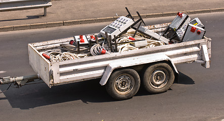 Image showing Electric components carried to their location