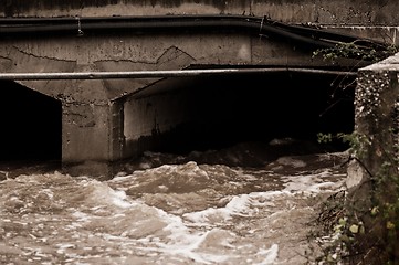 Image showing Flooded canal in the rain