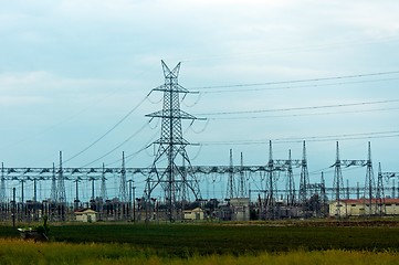 Image showing Hihg voltage post against blue sky