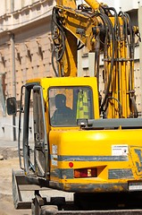 Image showing Big excavator at urban construction site