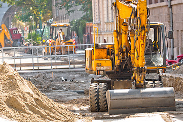 Image showing Big excavators at urban construction site