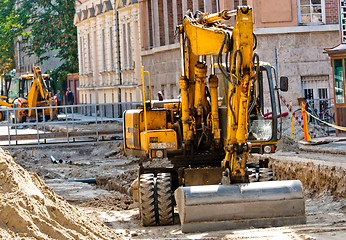 Image showing Big excavators at urban construction site