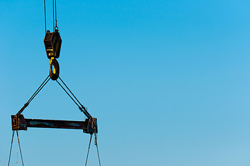 Image showing industrial crane against blue sky