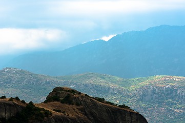 Image showing Beautiful tall mountains against blue sky