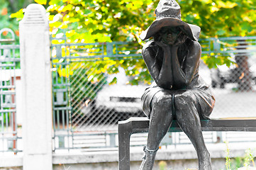 Image showing Woman made out of stone sitting in the park