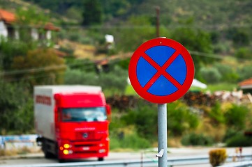 Image showing Traffic sign with car in the background