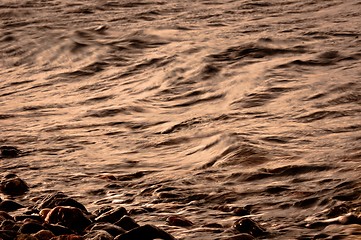 Image showing Rocks on the shore of an ocean