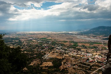 Image showing Sun shining down on small town