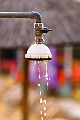 Image showing Water flowing out of shower at the beach