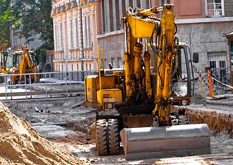 Image showing Big excavators at urban construction site