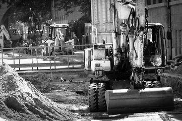 Image showing Big excavators at urban construction site