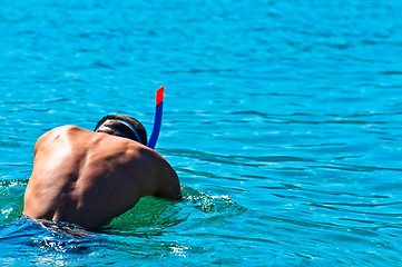 Image showing Young male diving into the sea