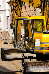 Image showing Big excavator at urban construction site