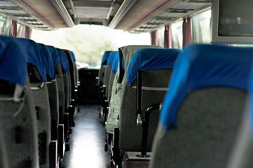 Image showing Interior of a bus with many seats